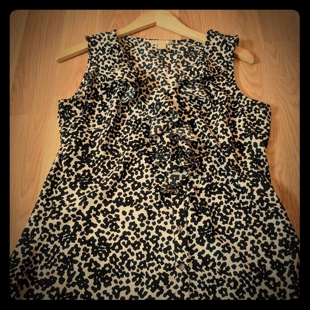 Leopard print sleeveless blouse with ruffle